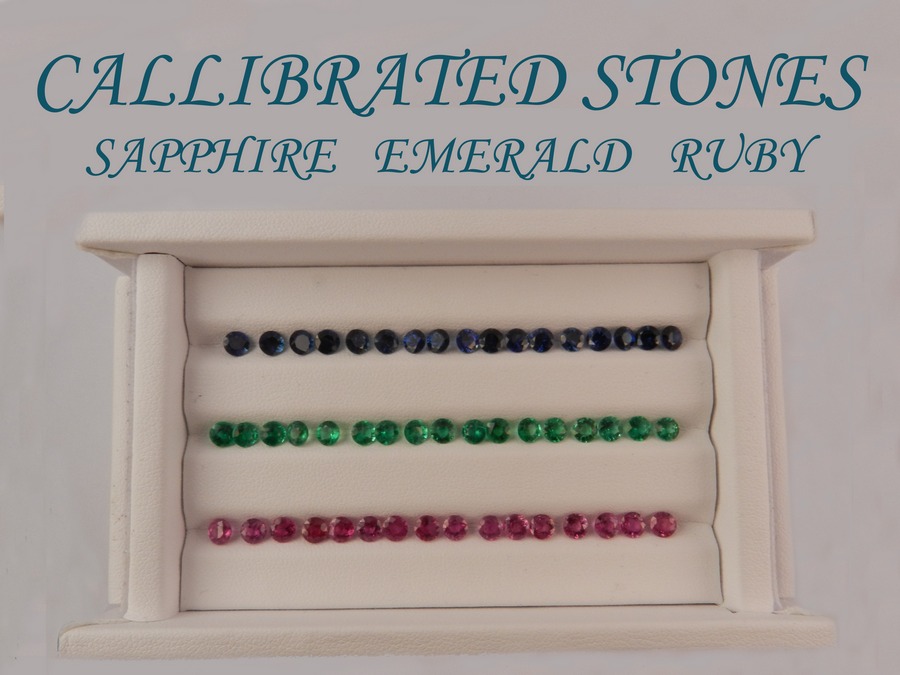 Rows of calibrated stones: sapphire, emerald, ruby